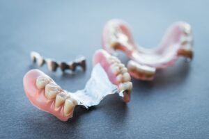 Read more about the article New Dentures, New Challenges? 5 Tips for New Denture Wearers